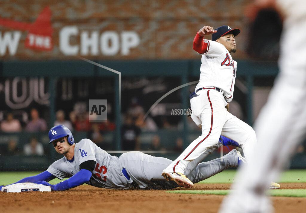 Bob Andres Los Angeles Dodgers' Trayce Thompson is safe stealing second after hitting a two RBI single during the ninth inning of a baseball game against the Atlanta Braves on Sunday, June 26, 2022, in Atlanta. The Dodgers won 5-3. (AP Photo/Bob Andres)
