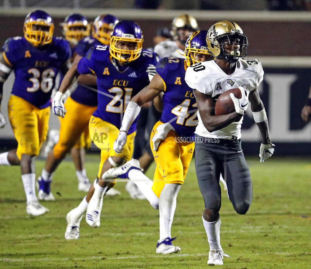 Karl B Deblaker Central Florida's Greg McCrae (30) runs the ball for a touchdown with the East Carolina defense in pursuit during the second half of an NCAA college football game in Greenville, N.C., Saturday, Oct. 20, 2018. UCF won 37-10. (AP Photo/Karl B DeBlaker)