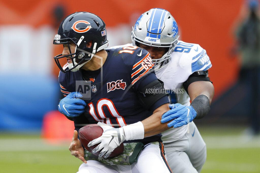 Charlie Neibergall Detroit Lions defensive end Trey Flowers (90) wraps up Chicago Bears quarterback Mitchell Trubisky (10) during the first half of an NFL football game in Chicago, Sunday, Nov. 10, 2019. (AP Photo/Charlie Neibergall)