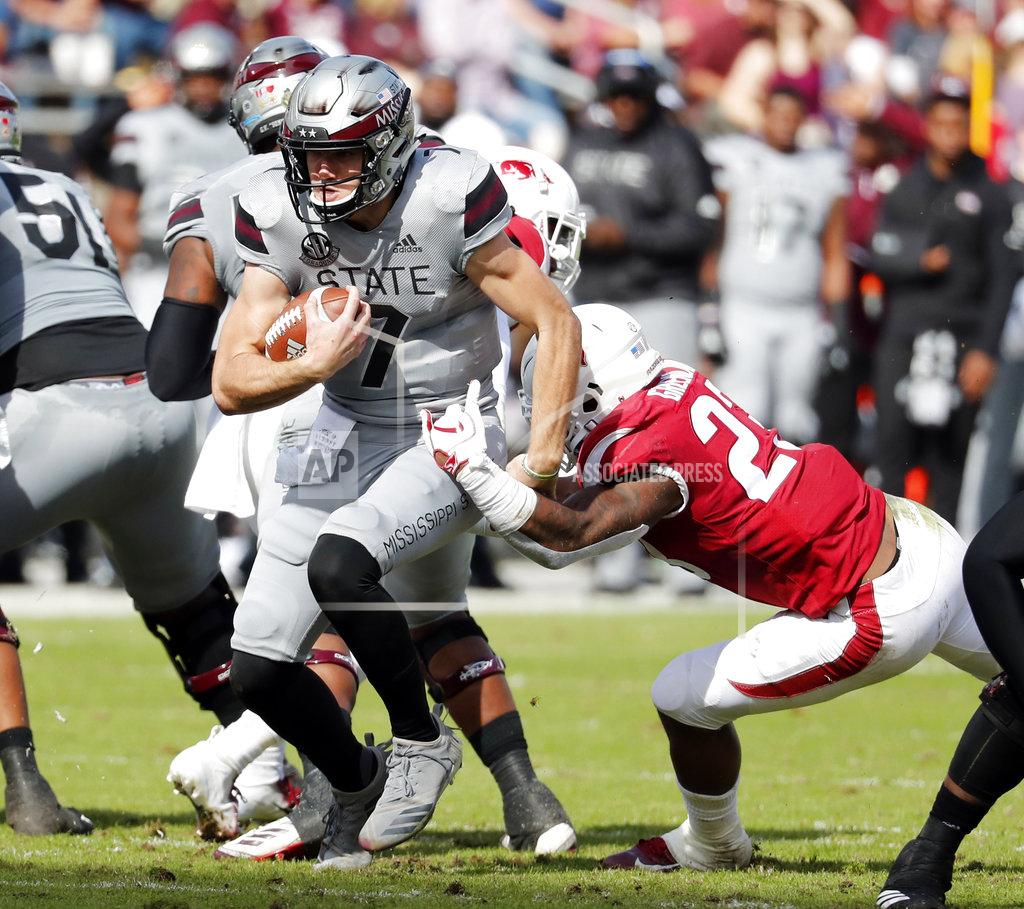Rogelio V. Solis Mississippi State quarterback Nick Fitzgerald (7) runs with the ball against Arkansas during the first half of an NCAA college football game in Starkville, Miss., Saturday, Nov. 17, 2018. Mississippi State won 52-6. (AP Photo/Rogelio V. Solis)