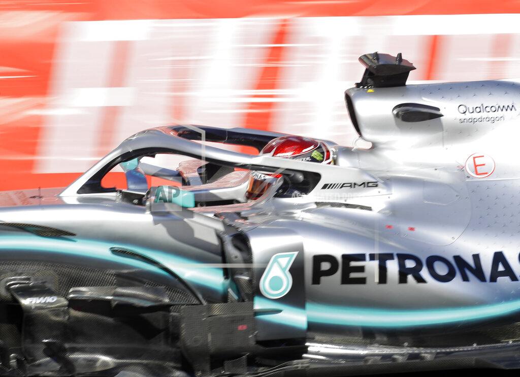 Sergei Grits Mercedes driver Lewis Hamilton of Britain, steers his car during the Formula One Grand Prix at the Baku Formula One city circuit in Baku, Azerbaijan, Sunday, April 28, 2019. (AP Photo/Sergei Grits)