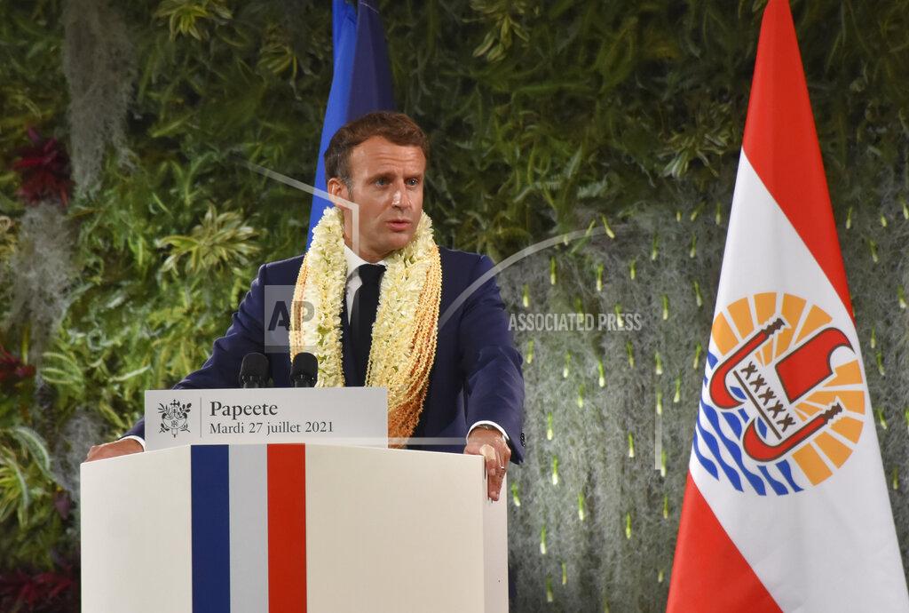 Esther Cuneo France's President Emmanuel Macron France's President wearing a flower lei and seashell necklaces delivers a speech after a meeting with the President of the French Polynesia Edouard Fitch in Tahiti, French Polynesia in the Pacific Ocean, Tuesday, 27, 2021.President Emmanuel Macron reasserted France's presence in the Pacific on a visit to French Polynesia aimed in part at countering growing Chinese dominance in the region. (AP Photo/Esther Cuneo)