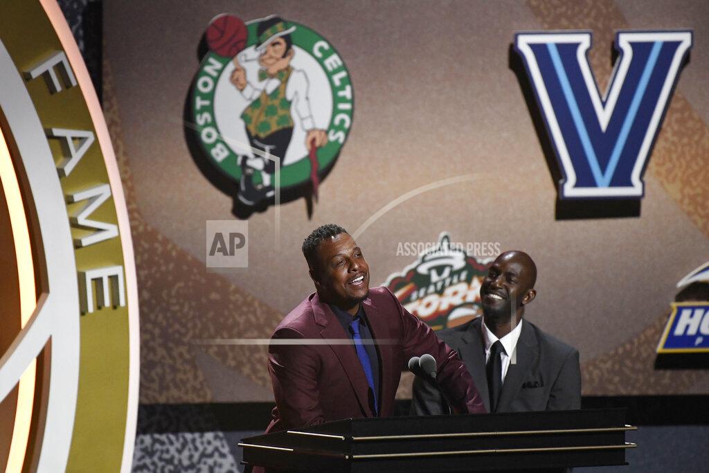 Jessica Hill Inductee Paul Pierce, left, speaks as teammate and presenter Kevin Garnett listens during the 2021 Basketball Hall of Fame Enshrinement ceremony, Saturday, Sept. 11, 2021, in Springfield, Mass. (AP Photo/Jessica Hill)