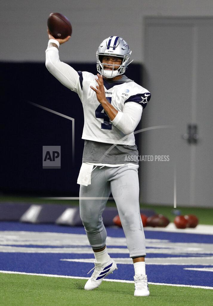 Tony Gutierrez Dallas Cowboys quarterback Dak Prescott (4) throws a pass during a work out at the team's NFL football practice facility in Frisco, Texas, Thursday, Sept. 5, 2019. (AP Photo/Tony Gutierrez)