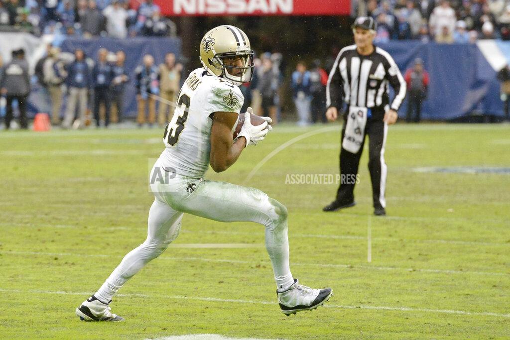 Mark Zaleski New Orleans Saints wide receiver Michael Thomas (13) makes a reception against the Tennessee Titans in the second half of an NFL football game Sunday, Dec. 22, 2019, in Nashville, Tenn. The catch gave Thomas the single-season pass reception record. (AP Photo/Mark Zaleski)