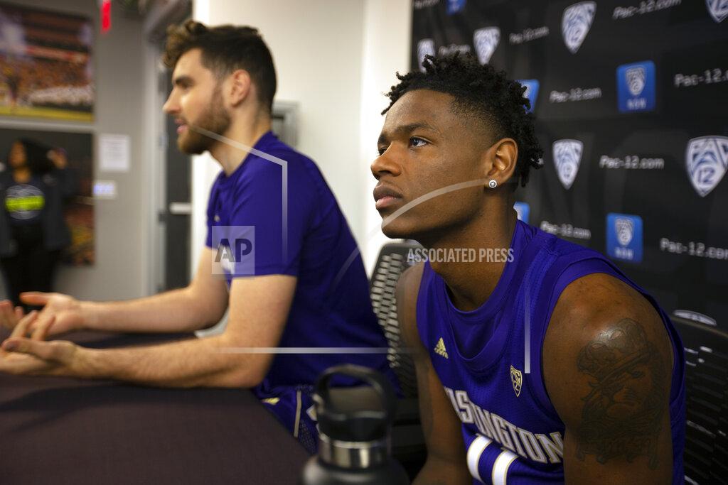 D. Ross Cameron Washington's Sam Timmins, left, and Nahziah Carter speak during the Pac-12 NCAA college basketball media day, in San Francisco, Tuesday, Oct. 8, 2019. (AP Photo/D. Ross Cameron)