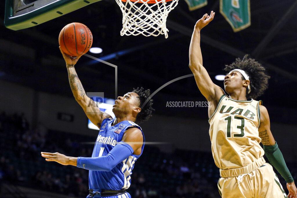 Butch Dill Memphis guard Tyler Harris (1) puts up a shot around UAB guard Jalen Benjamin (13) during the first half of an NCAA college basketball game Saturday, Dec. 7, 2019, in Birmingham, Ala. (AP Photo/Butch Dill)