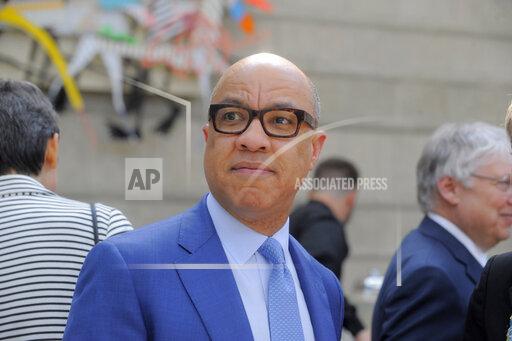 FILE - Ford Foundation President Darren Walker attends a reception at the Charles H. Wright Museum in Detroit, on Tuesday, June 16, 2015. Ford Foundation, one of the largest private foundations in the United States, announced Monday, Oct. 18, 2021 that it will divest millions from fossil fuels, following similar investment decisions made by other sizable foundations in recent years. (Steve Perez/Detroit News via AP)