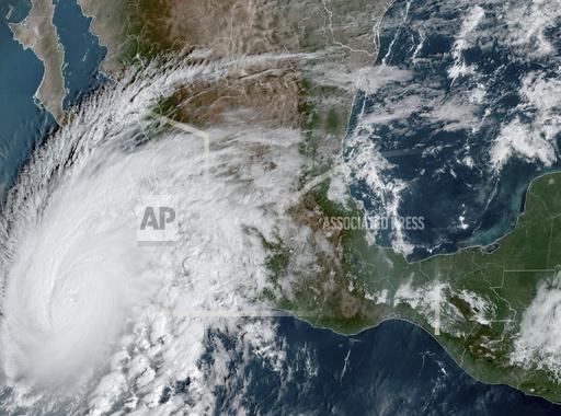 This satellite image provided by NOAA on Thursday, Oct. 19, 2023, shows Hurricane Storm Norma approaching the southern tip of the Baja California peninsula on Mexico's Pacific coast. (NOAA via AP)