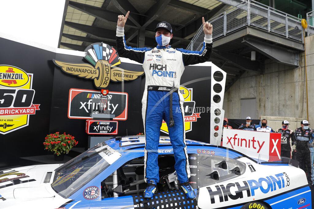 Darron Cummings NASCAR Xfinity Series driver Chase Briscoe celebrates winning the NASCAR Xfinity Series auto race at Indianapolis Motor Speedway in Indianapolis, Saturday, July 4, 2020. (AP Photo/Darron Cummings)