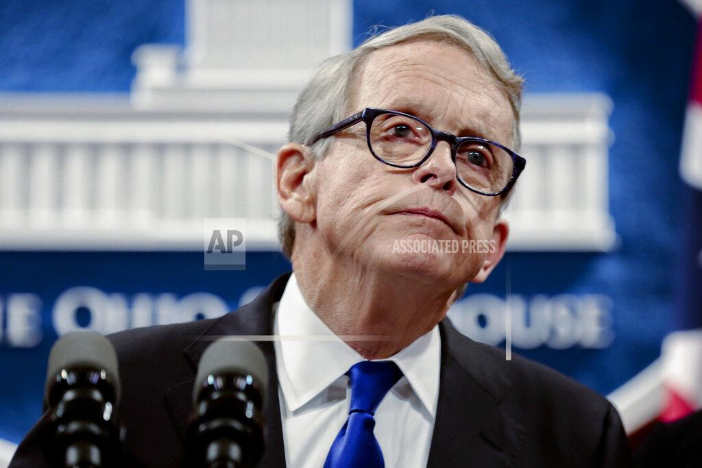 FILE - In this file photo from Aug. 6, 2019, Ohio Gov. Mike DeWine pauses while speaking at the Ohio Statehouse in Columbus, Ohio. DeWine is ready to unveil his upcoming state budget Monday, Feb. 1, 2021, with proposals to fund everything from schools, public colleges and universities, health care for poor children and families, and prison operations. This is the Republican governor's second budget proposal but the first to reflect revenue downturns caused by the coronavirus pandemic. (Joshua A. Bickel/The Columbus Dispatch via AP, File)