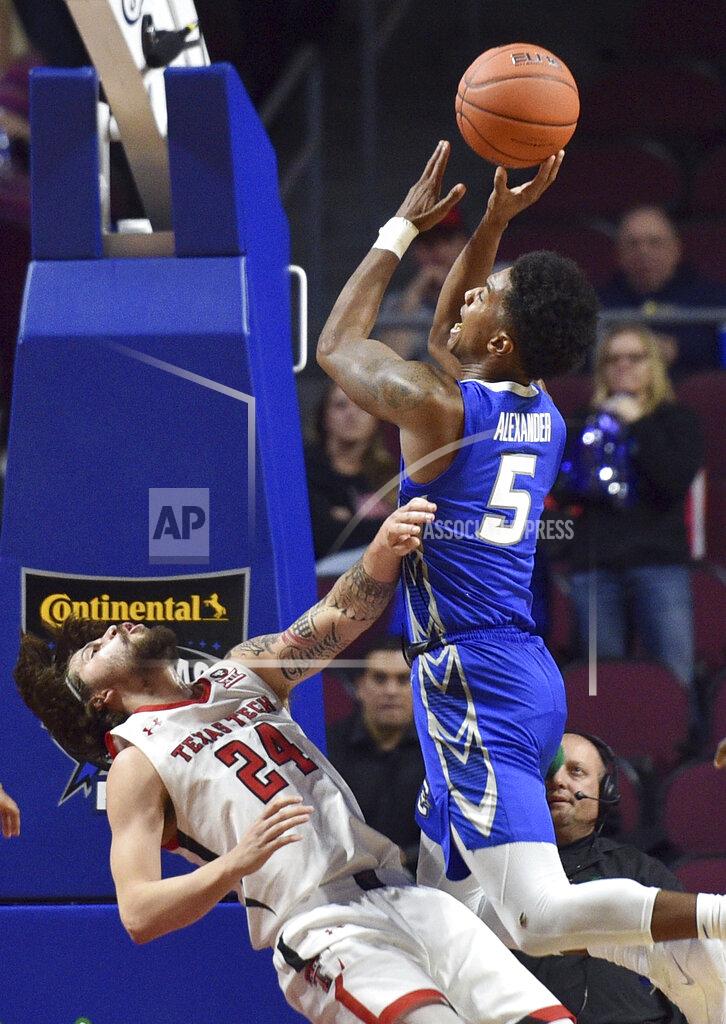 David Becker Creighton guard Ty-Shon Alexander (5) shoots over Texas Tech guard Avery Benson during the second half of an NCAA college basketball game Friday, Nov. 29, 2019, in Las Vegas. (AP Photo/David Becker)