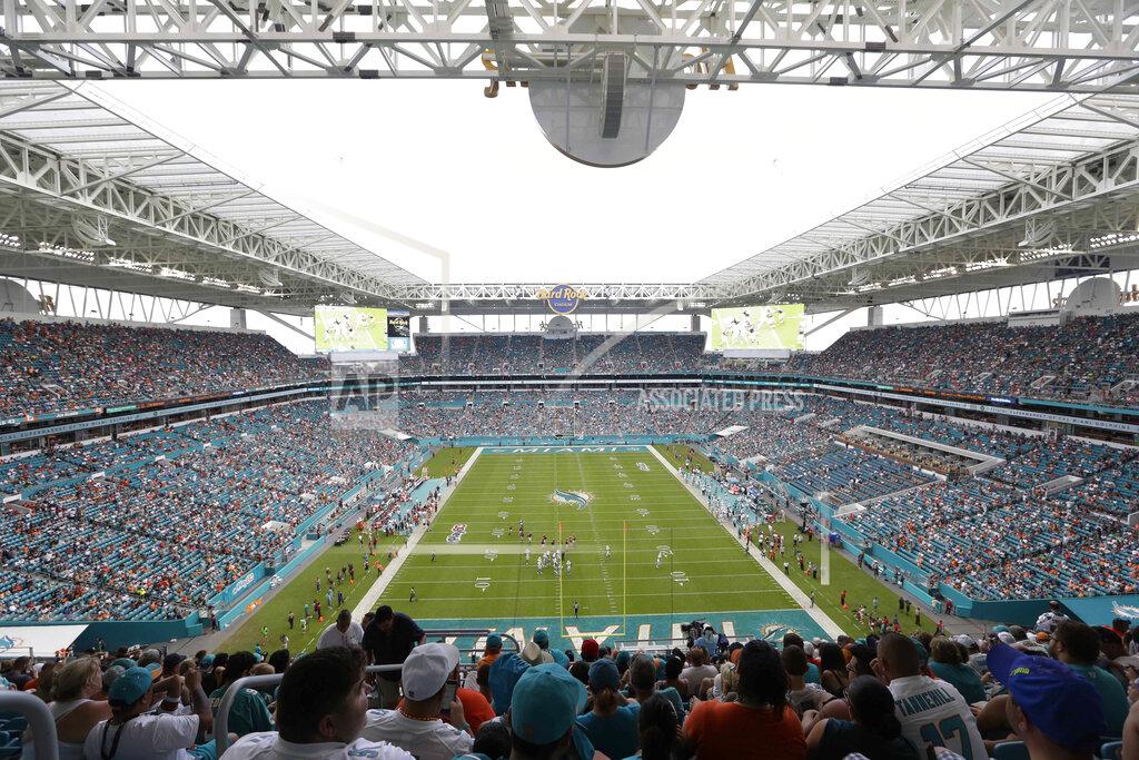 FILE - In this Sunday, Sept. 25, 2016 file photo, Hard Rock Stadium is seen during the second half of an NFL football game between the Miami Dolphins and the Cleveland Browns, in Miami Gardens, Fla. The Miami Dolphins NFL football team has decided to allow up to 13,000 socially distancing fans to attend their home opener against the Buffalo Bills on Sept 20, with the approval of state and local political leaders. (AP Photo/Lynne Sladky, File)