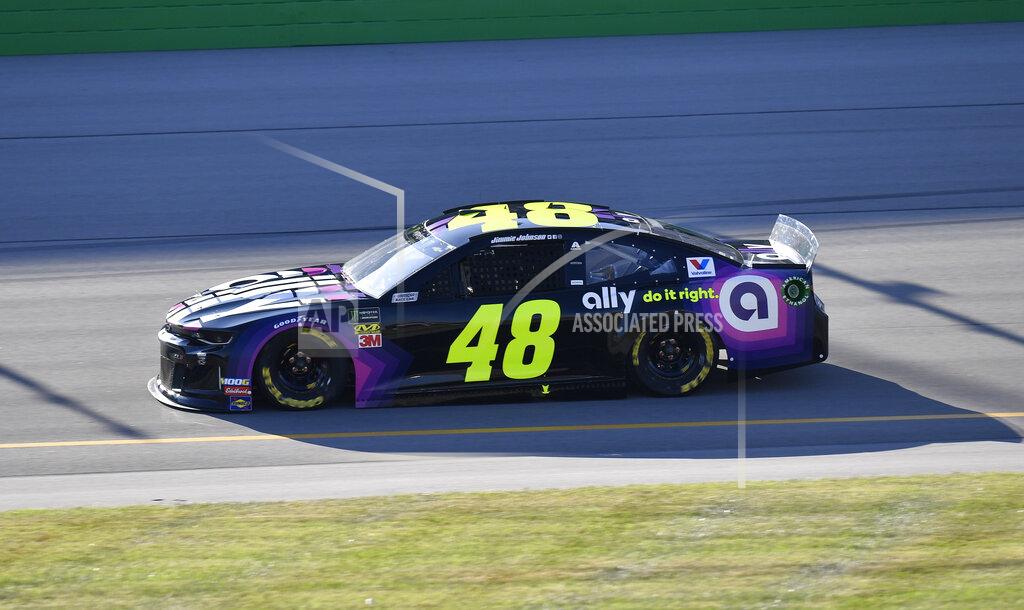 Timothy D. Easley Jimmie Johnson completes his qualifying lap for a NASCAR Series auto race at Kentucky Speedway in Sparta, Ky., Friday, July 12, 2019. (AP Photo/Timothy D. Easley)