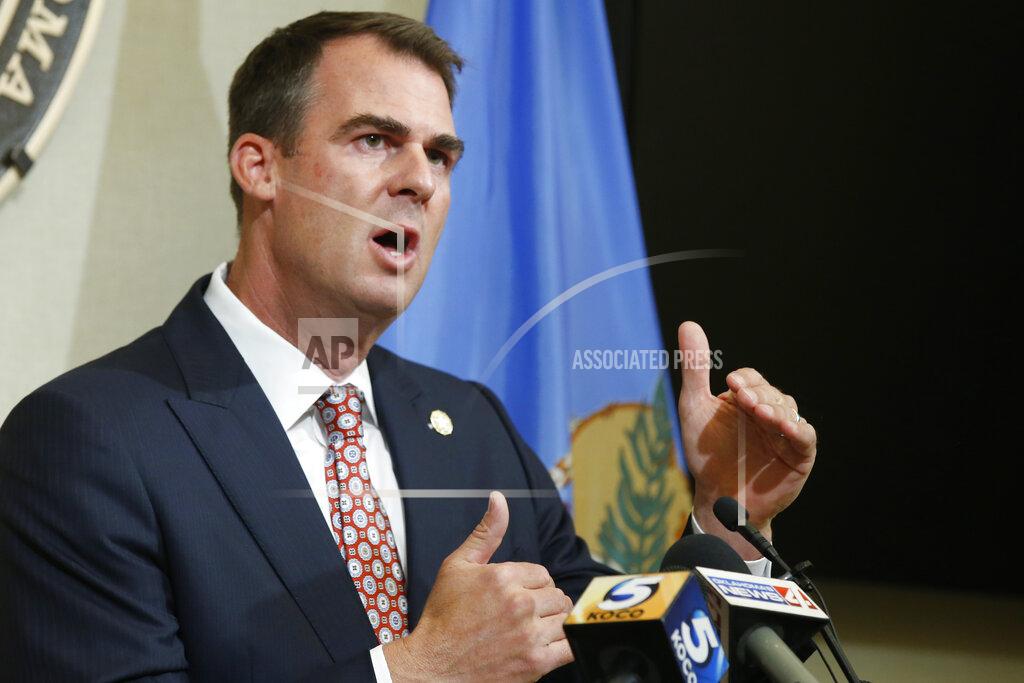 Sue Ogrocki FILE - In this July 9, 2020 file photo, Oklahoma Gov. Kevin Stitt speaks during a news conference in Oklahoma City. Stitt, the first governor in the nation to test positive for the coronavirus, says he has donated plasma to help other virus patients recover. Stitt said in a statement Tuesday, Aug. 11th that he made the donation recently at an Oklahoma Blood Institute center in Enid. (AP Photo/Sue Ogrocki, File)