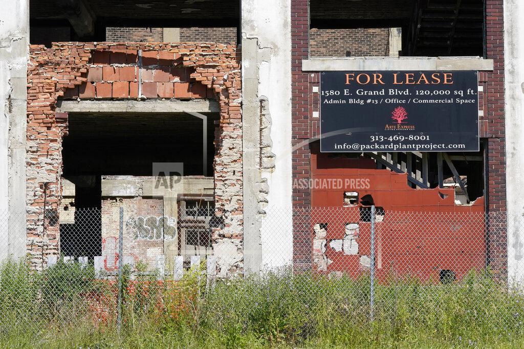 Carlos Osorio Exterior of the Packard Plant on Detroit's east side, Thursday, June 30, 2022. The factory built in the early 1900s turned out high-end cars into the 1950s. It was considered one of the city's automotive jewels, but now is among the nation's most notorious examples of urban blight. Parts of the 3.5 million-square-foot, 40-acre Packard plant complex will be demolished by the year's end. (AP Photo/Carlos Osorio)