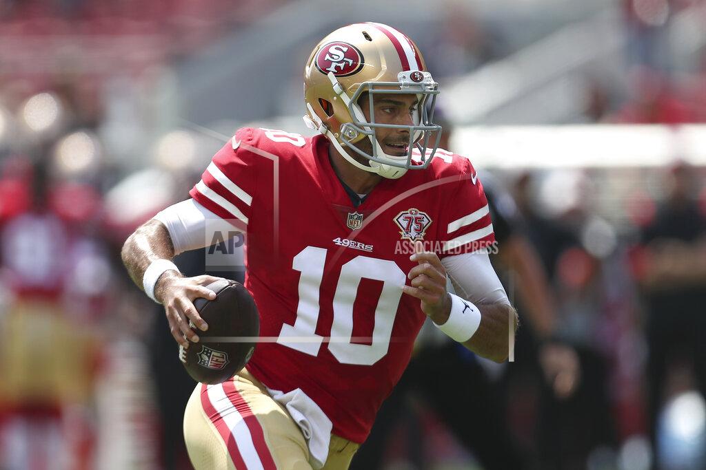 Jed Jacobsohn San Francisco 49ers quarterback Jimmy Garoppolo runs for a touchdown against the Las Vegas Raiders during the first half of an NFL preseason football game in Santa Clara, Calif., Sunday, Aug. 29, 2021. (AP Photo/Jed Jacobsohn)