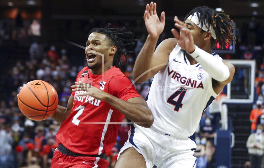 Andrew Shurtleff RADFORD'S JOSIAH JEFFERS, NOT COPPIN STATE GUARD MIKE HOOD - Radford's Josiah Jeffers (2) moves past Virginia guard Armaan Franklin (4) during an NCAA college basketball game in Charlottesville, Va., Friday, Nov. 12, 2021. (AP Photo/Andrew Shurtleff)