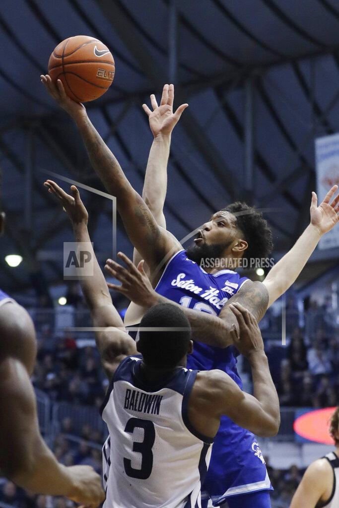 Darron Cummings Seton Hall's Myles Powell (13) puts up a shot against Butler's Kamar Baldwin (3) during the second half of an NCAA college basketball game, Saturday, Feb. 2, 2019, in Indianapolis. Butler won 70-68. (AP Photo/Darron Cummings)