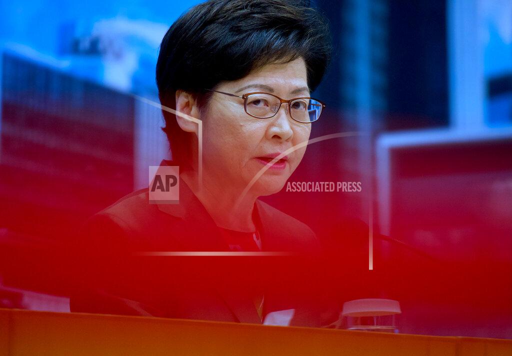 Vincent Yu Hong Kong Chief Executive Carrie Lam speaks during a press conference in Hong Kong, Tuesday, April 13, 2021. Lam said Tuesday that Hong Kong's legislative elections would take place in December, more than a year after they were postponed last year with authorities citing public health risks from the coronavirus pandemic. (AP Photo/Vincent Yu)
