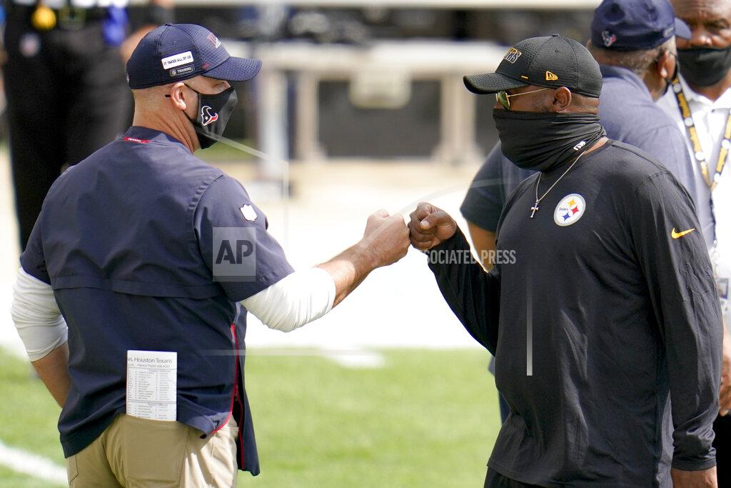 Gene J. Puskar Houston Texans head coach Bill O'Brien, left, greets Pittsburgh Steelers head coach Mike Tomlin before an NFL football game, Sunday, Sept. 27, 2020, in Pittsburgh. (AP Photo/Gene J. Puskar)