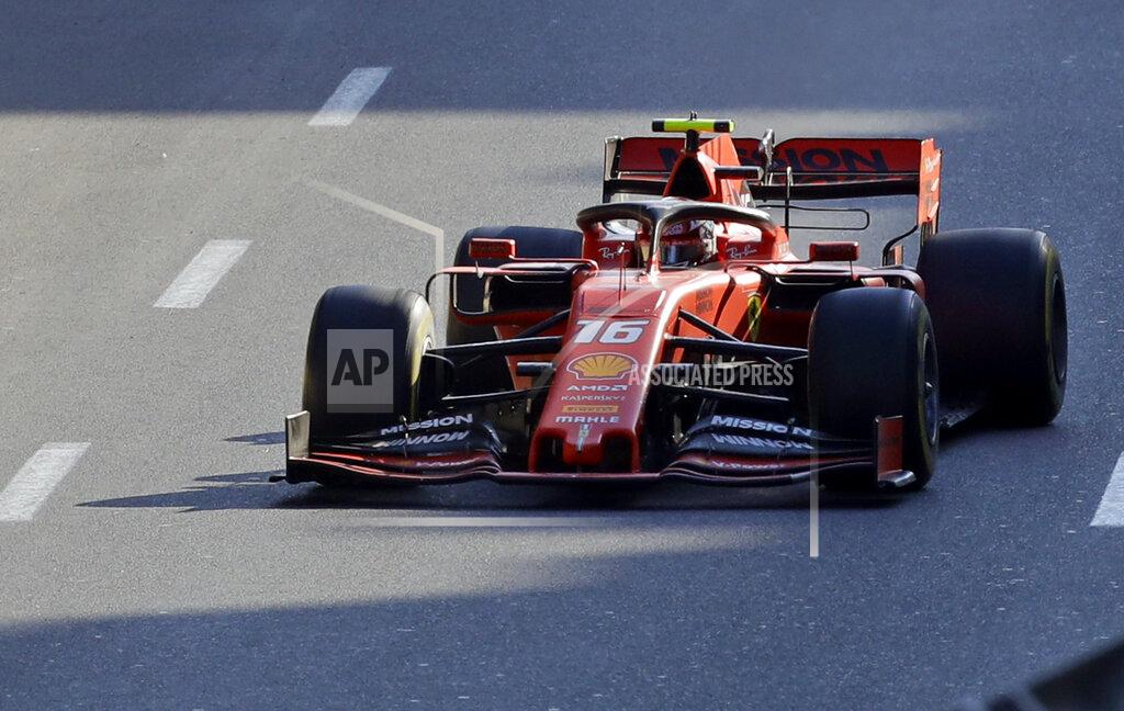 Sergei Grits Ferrari driver Charles Leclerc of Monaco steers his car during the Formula One Grand Prix at the Baku Formula One city circuit in Baku, Azerbaijan, Sunday, April 28, 2019. (AP Photo/Sergei Grits)