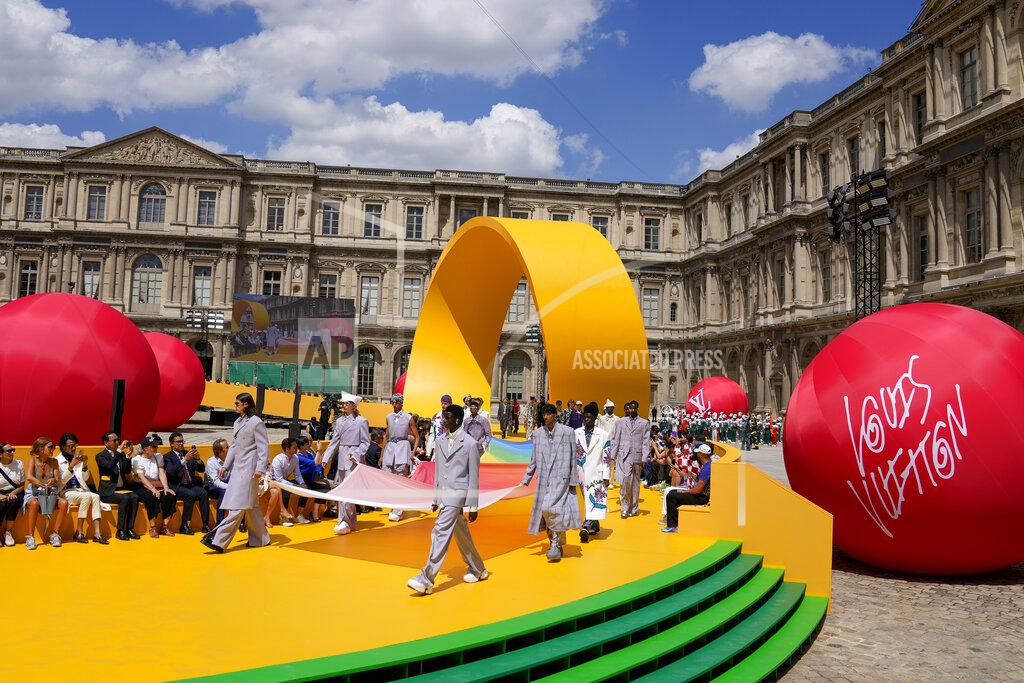 Francois Mori CORRECTS DATE Models wear creations as part of the Louis Vuitton men's Spring Summer 2023 collection presented in Paris, France, Thursday, June 23, 2022. (AP Photo/Francois Mori)