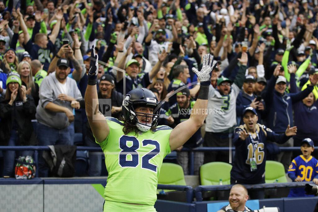 Stephen Brashear Seattle Seahawks tight end Luke Willson celebrates after wide receiver Tyler Lockett scored a touchdown against the Los Angeles Rams during the first half of an NFL football game Thursday, Oct. 3, 2019, in Seattle. (AP Photo/Stephen Brashear)
