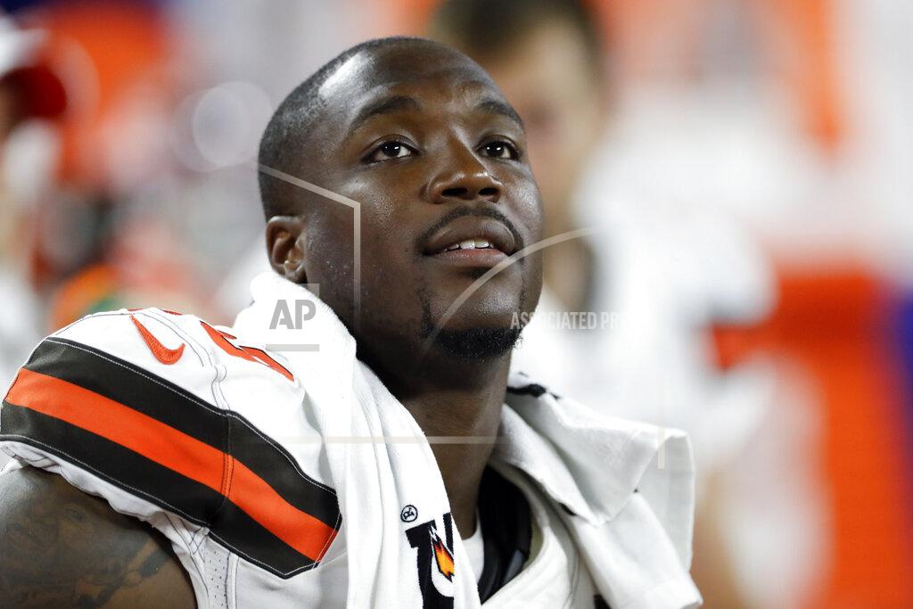 Ron Schwane FILE - In this Aug. 8, 2019, file photo, Cleveland Browns defensive end Chris Smith (50) sits on the sideline during the first half of an NFL preseason football game against the Washington Redskins in Cleveland. Authorities say a motorist who struck and killed the girlfriend of Smith will not be charged. Cleveland police said Friday, Nov. 1, that the 47-year-old woman wasn’t impaired, speeding or driving erratically when she struck 26-year-old Petara Cordero in September along Interstate 90. Cordero was the girlfriend of the Browns defensive end. (AP Photo/Ron Schwane, File)