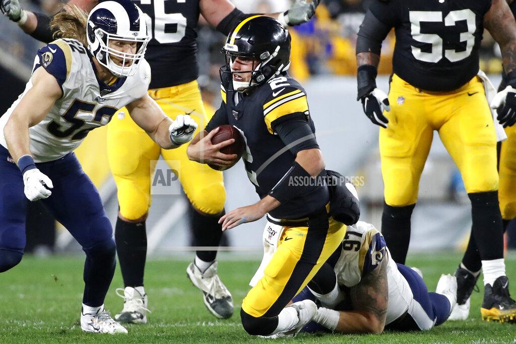 Don Wright Pittsburgh Steelers quarterback Mason Rudolph (2) is sacked by Los Angeles Rams defensive end Morgan Fox (97) during the first half of an NFL football game in Pittsburgh, Sunday, Nov. 10, 2019. (AP Photo/Don Wright)