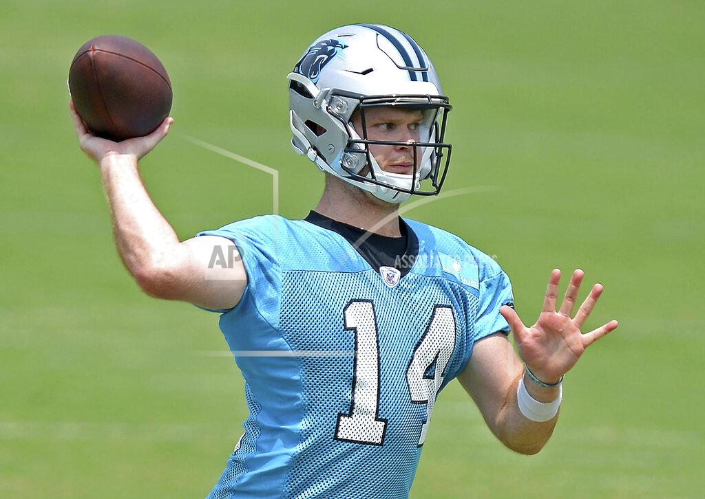 Jeff Siner Carolina Panthers quarterback Sam Darnold passes to a receiver during the team's OTA football practice on Tuesday, May 25, 2021 in Charlotte, N.C. (Jeff SIner/The Charlotte Observer via AP)