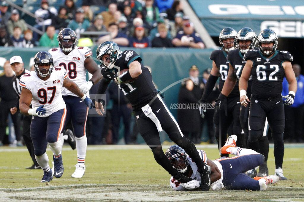 Chris Szagola Philadelphia Eagles' Carson Wentz (11) is tackled by Chicago Bears' Leonard Floyd (94) during the second half of an NFL football game, Sunday, Nov. 3, 2019, in Philadelphia. (AP Photo/Chris Szagola)