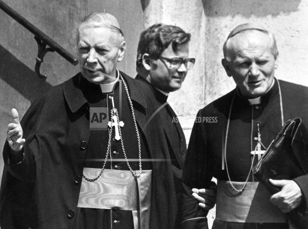 Anonymous FILE - In this Oct. 16, 1978 file photo, Karol Cardinal Wojtyla, right, is pictured together with Stefan Cardinal Wyszynski, left, when both head for the cardinals congregation meeting in Vatican City. Cardinal Wojtyla has been elected as successor for late Pope John Paul I by the conclavists and will head the catholic church by the name of Pope John Paul II as the first non-Italian Pope in 450 years. Poland's top political leaders gathered in a Warsaw church Sunday, Sept. 12, 2021 for the beatification of two revered figures of the Catholic church — a cardinal who led the Polish church's resistance to communism and a blind nun who devoted her life to helping others who couldn't see. (AP Photo, File)