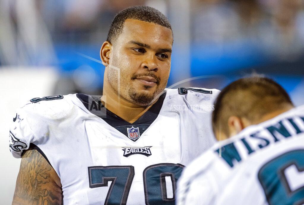 Bob Leverone FILE - In this Oct. 12, 2017, file photo, Philadelphia Eagles' Brandon Brooks (79) sits on the bench during the second half of an NFL football game against the Carolina Panthers in Charlotte, N.C. Brooks said pressure of trying to live up to a new contract led to an anxiety attack that forced him out of the Philadelphia Eagles’ game last Sunday, Nov. 24, 2019. Brooks has dealt with anxiety for several years but has started 50 straight games, including the playoffs. But he recently signed a four-year, $54.2 million contract and it weighed on his mind. (AP Photo/Bob Leverone, File)