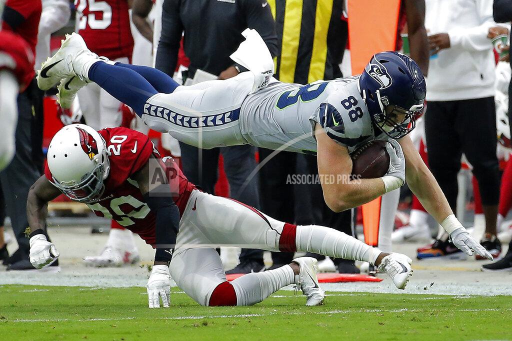Rick Scuteri Seattle Seahawks tight end Will Dissly (88) is hit by Arizona Cardinals defensive back Tramaine Brock (20) during the first half of an NFL football game, Sunday, Sept. 29, 2019, in Glendale, Ariz. (AP Photo/Rick Scuteri)