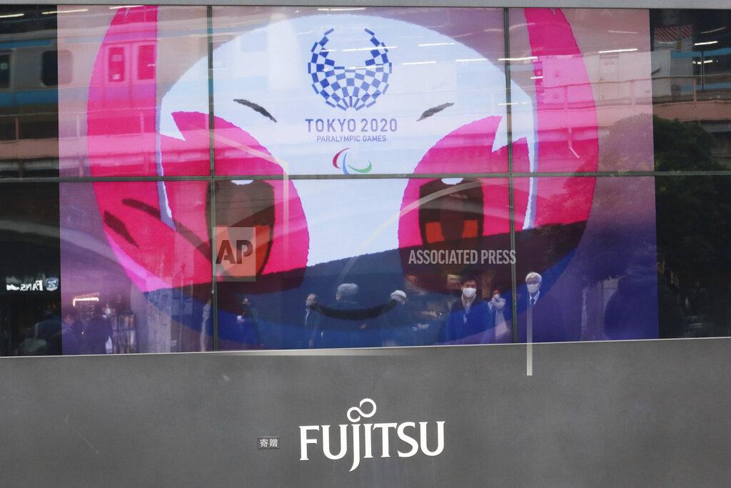Koji Sasahara FILE - In this Dec. 9, 2020, file photo, a TV monitor displays Tokyo 2020 Paralympic Games mascot Someity in Tokyo, Wednesday, Dec. 9, 2020. Tokyo Olympic officials said Thursday, Dec. 24, they have reached a “basic agreement” with all 68 domestic sponsors to extend their contracts into next year to support the postponed Games. (AP Photo/Koji Sasahara, File)