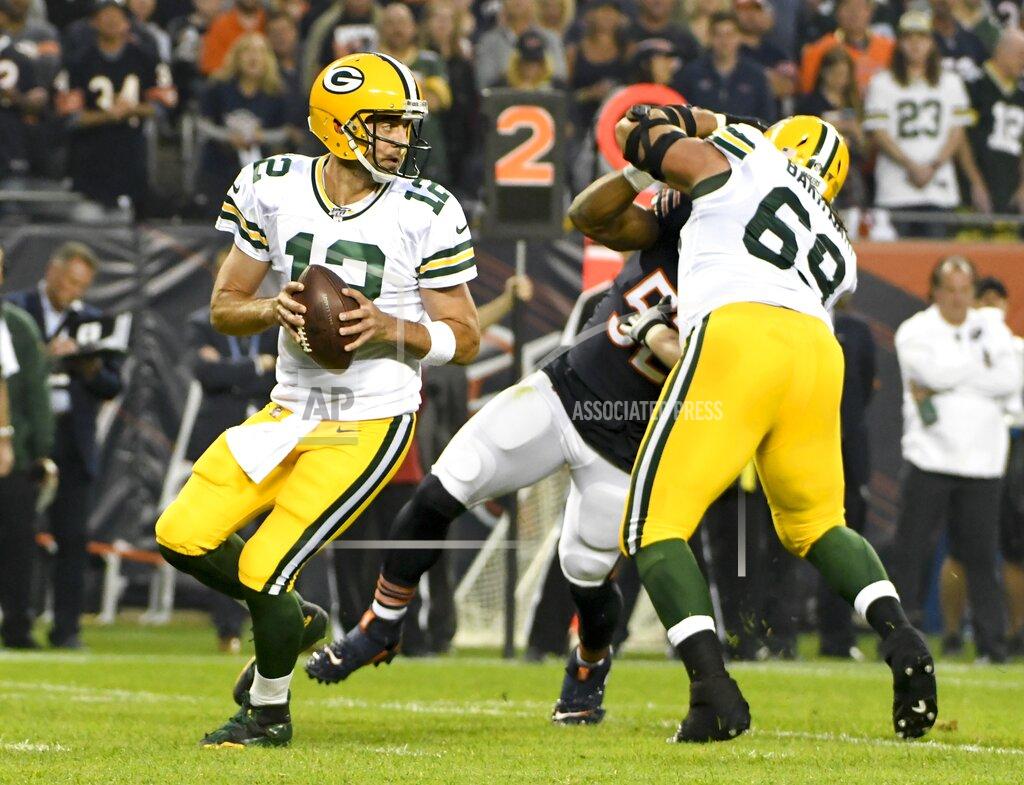 David Banks Green Bay Packers' Aaron Rodgers drops back during the first half of an NFL football game against the Chicago Bears Thursday, Sept. 5, 2019, in Chicago. (AP Photo/David Banks)