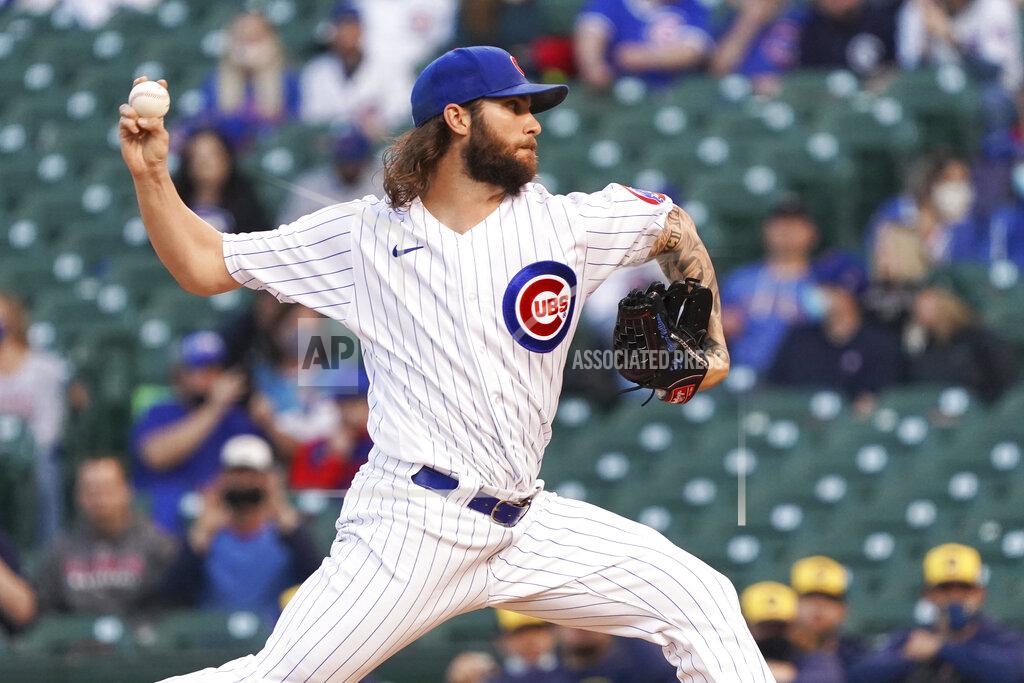 David Banks Chicago Cubs starting pitcher Trevor Williams (32) throws against the Milwaukee Brewers during the first inning of a baseball game, Monday, April, 5, 2021, in Chicago. (AP Photo/David Banks)