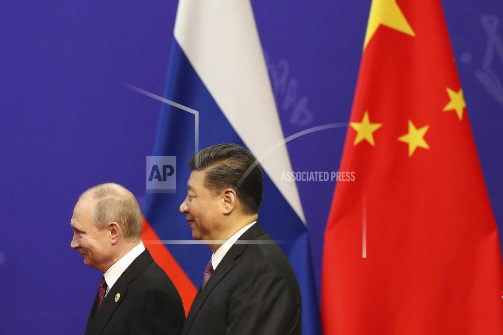 Kenzaburo Fukuhara FILE - In this April 26, 2019, file photo, Russian President Vladimir Putin, left, and Chinese President Xi Jinping, right, attend an event at the Friendship Palace in Beijing. Putin and Xi have developed strong personal ties helping bolster a “strategic partnership” between the two former Communist rivals. (Kenzaburo Fukuhara/Pool Photo via AP, File)