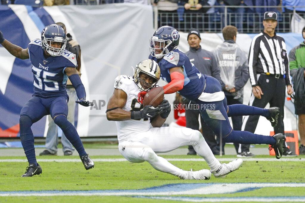 James Kenney New Orleans Saints tight end Jared Cook (87) catches a 16-yard touchdown pass as he is defended by Tennessee Titans free safety Kevin Byard, right, and cornerback Tramaine Brock Sr. (35) in the second half of an NFL football game Sunday, Dec. 22, 2019, in Nashville, Tenn. (AP Photo/James Kenney)