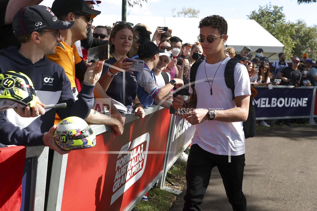 Asanka Brendon Ratnayake FILE - McLaren driver Lando Norris of Britain signs autographs as he arrives at the track ahead of the Australian Formula One Grand Prix in Melbourne, Australia, Thursday, April 7, 2022. Exhaustive fan surveys showed McLaren was voted the most popular F1 team, while Lando Norris won favorite driver among female fans and all fans aged 25 or younger. In IndyCar, a similar survey found Arrow McLaren SP the second most popular team and Pato O'Ward the most popular driver among female voters. (AP Photo/Asanka Brendon Ratnayake, File)