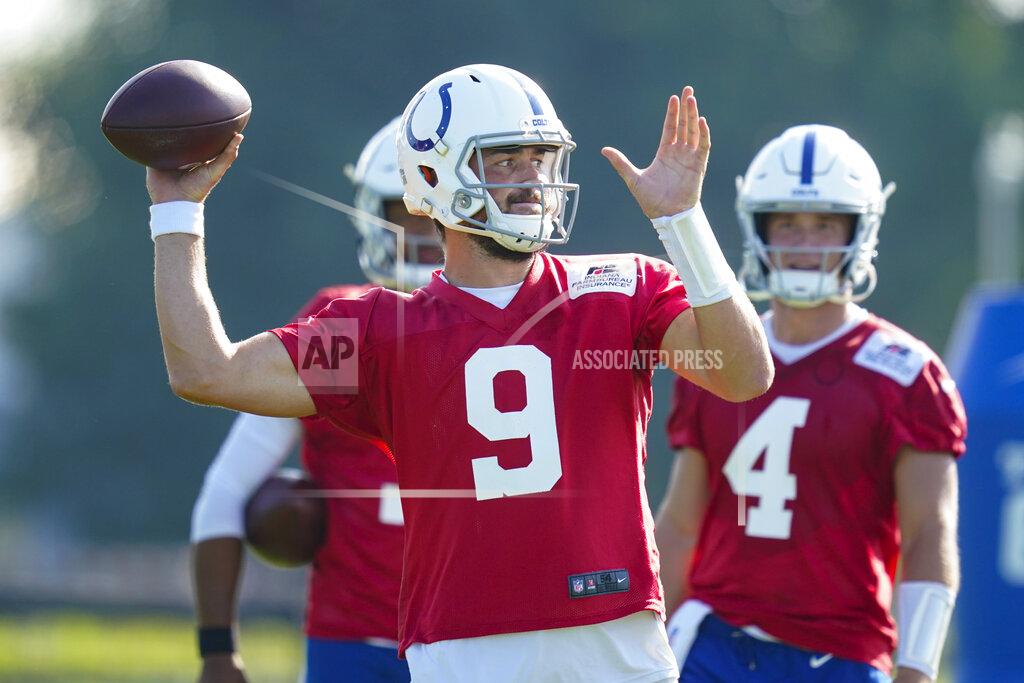 Michael Conroy Indianapolis Colts quarterback Jacob Eason (9) throws during practice at the NFL team's football training camp in Westfield, Ind., Tuesday, Aug. 24, 2021. (AP Photo/Michael Conroy)