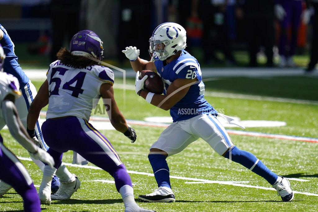 Michael Conroy Indianapolis Colts' Jonathan Taylor (28) runs against Minnesota Vikings' Eric Kendricks (54) during the first half of an NFL football game, Sunday, Sept. 20, 2020, in Indianapolis. (AP Photo/Michael Conroy)