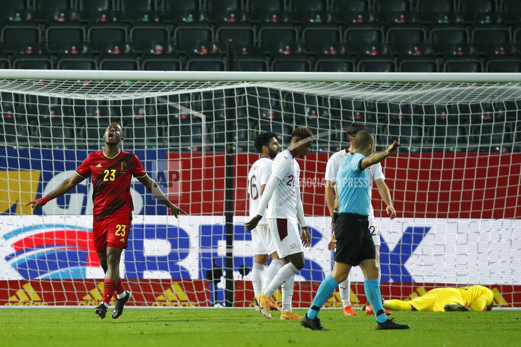 Francisco Seco Belgium's Michy Batshuayi, left, jubilates after scoring his sides second goal during an international friendly soccer match between Belgium and Switzerland at the King Power stadium in Leuven, Belgium, Wednesday, Nov. 11, 2020. (AP Photo/Francisco Seco)