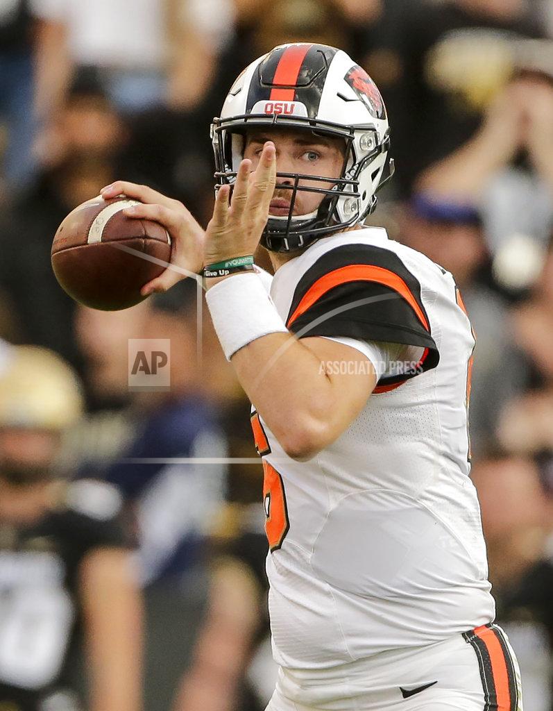 Jack Dempsey Oregon State quarterback Jake Luton looks to throw against Colorado during the second half of an NCAA football game, Saturday, Oct. 27, 2018, in Boulder, Colo. (AP Photo/Jack Dempsey)