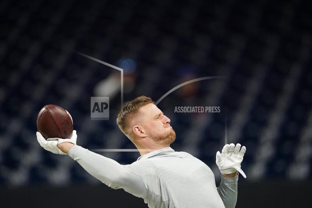 David J. Phillip FILE - In this Dec. 1, 2019, file photo Houston Texans defensive end J.J. Watt before an NFL football game against the New England Patriots in Houston. Watt will return to practice with the Houston Texans on Tuesday, clearing the way for the star defensive end to play in the team's playoff game in two weeks. (AP Photo/David J. Phillip, File)