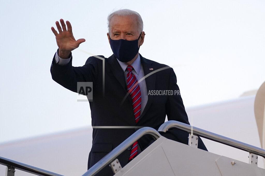 Patrick Semansky President Joe Biden boards Air Force One at Andrews Air Force Base, Md., Friday, Feb. 5, 2021. Biden is spending the weekend at his home in Delaware. (AP Photo/Patrick Semansky)