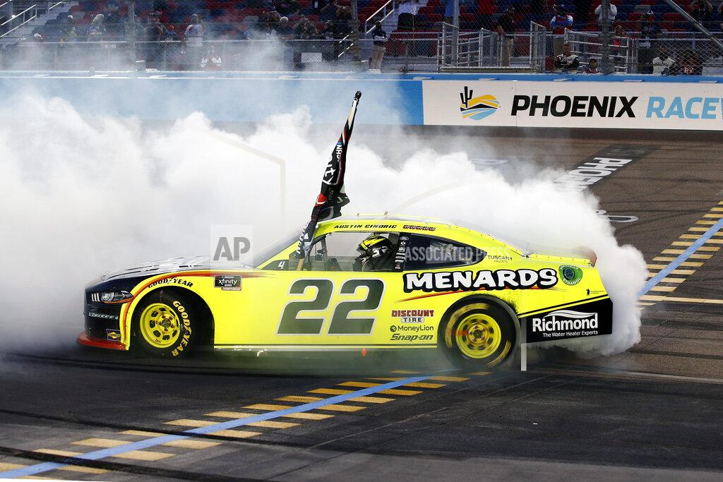 Ralph Freso Austin Cindric does a burnout at the finish line after winning the season championship and a NASCAR Xfinity Series auto race at Phoenix Raceway, Saturday, Nov. 7, 2020, in Avondale, Ariz. (AP Photo/Ralph Freso)