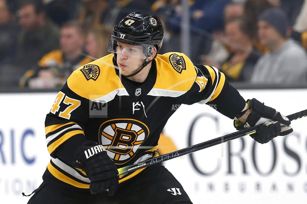 Michael Dwyer FILE - In this Dec. 3, 2019, file photo, Boston Bruins' Torey Krug plays against the Carolina Hurricanes during an NHL hockey game in Boston. Krug and many other pending free agents would have already cashed in at this point in the summer in a regular year. Instead, returning to compete in the NHL playoffs after time away represents a significant injury risk with free agency looming in October and the chance of something serious jeopardizing next season. (AP Photo/Michael Dwyer, File)