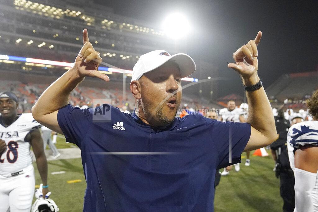 Charles Rex Arbogast UTSA head coach Jeff Taylor celebrates his team's win over Illinois in an NCAA college football game Saturday, Sept. 4, 2021, in Champaign, Ill. (AP Photo/Charles Rex Arbogast)